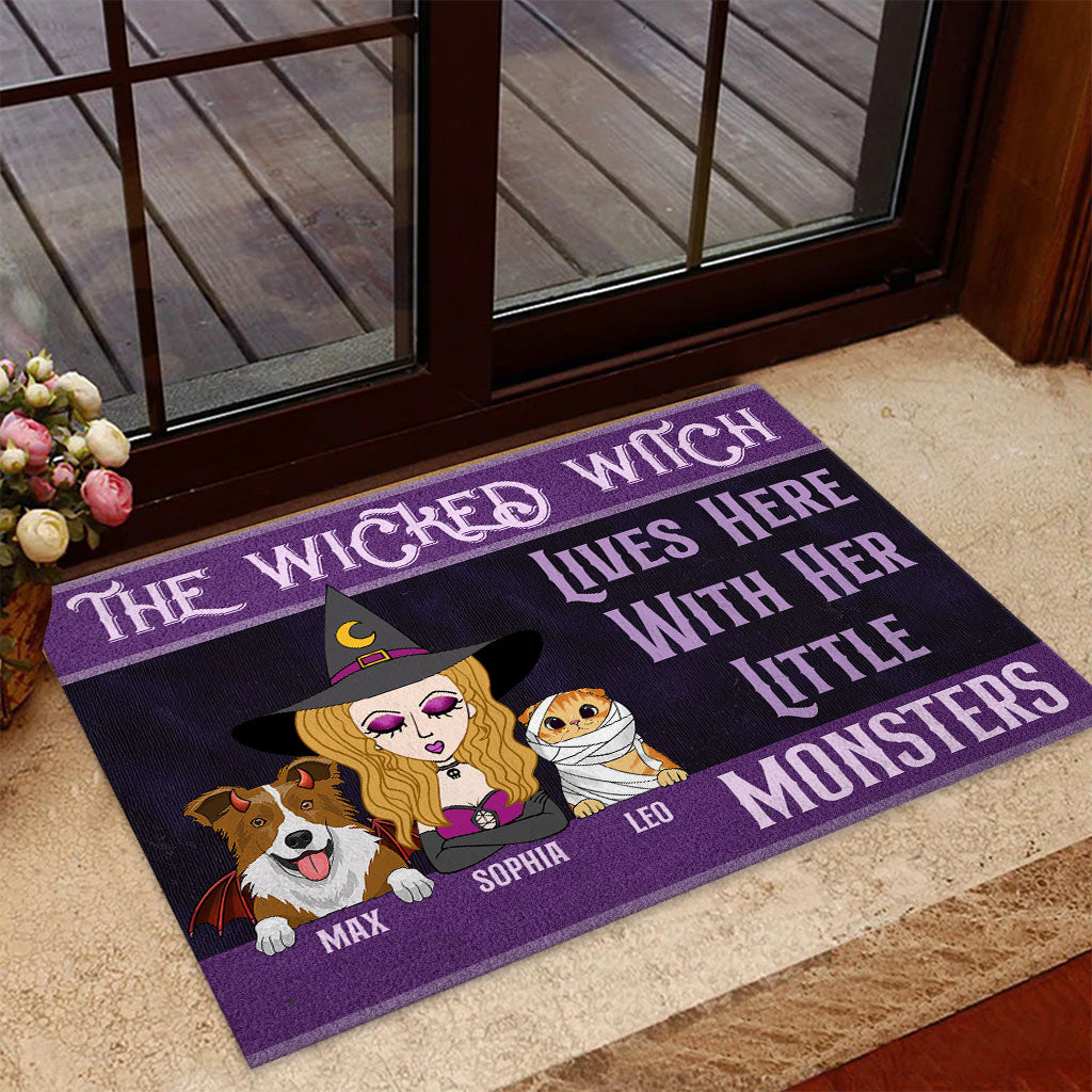The Wicked Witch Lives Here Witrh Her Little Monsters - Personalized Dog Doormat